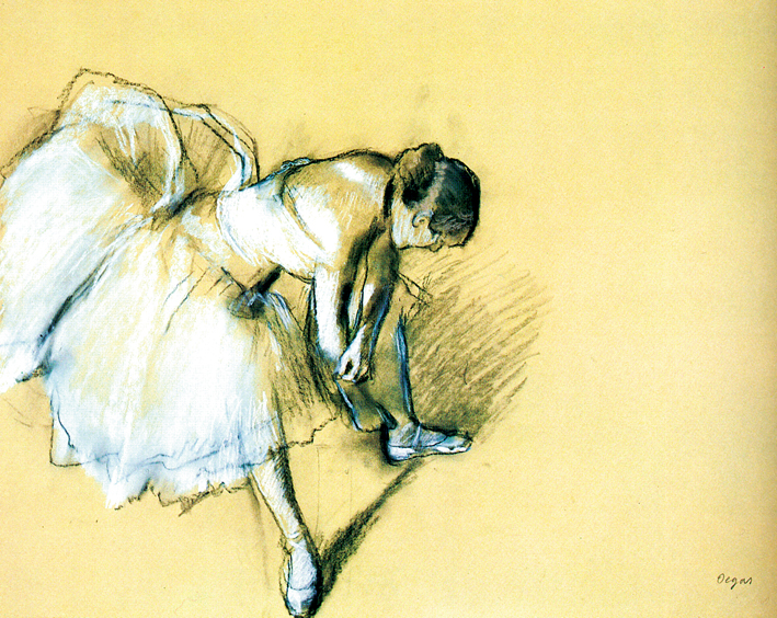  dancer lacing her dancing shoe